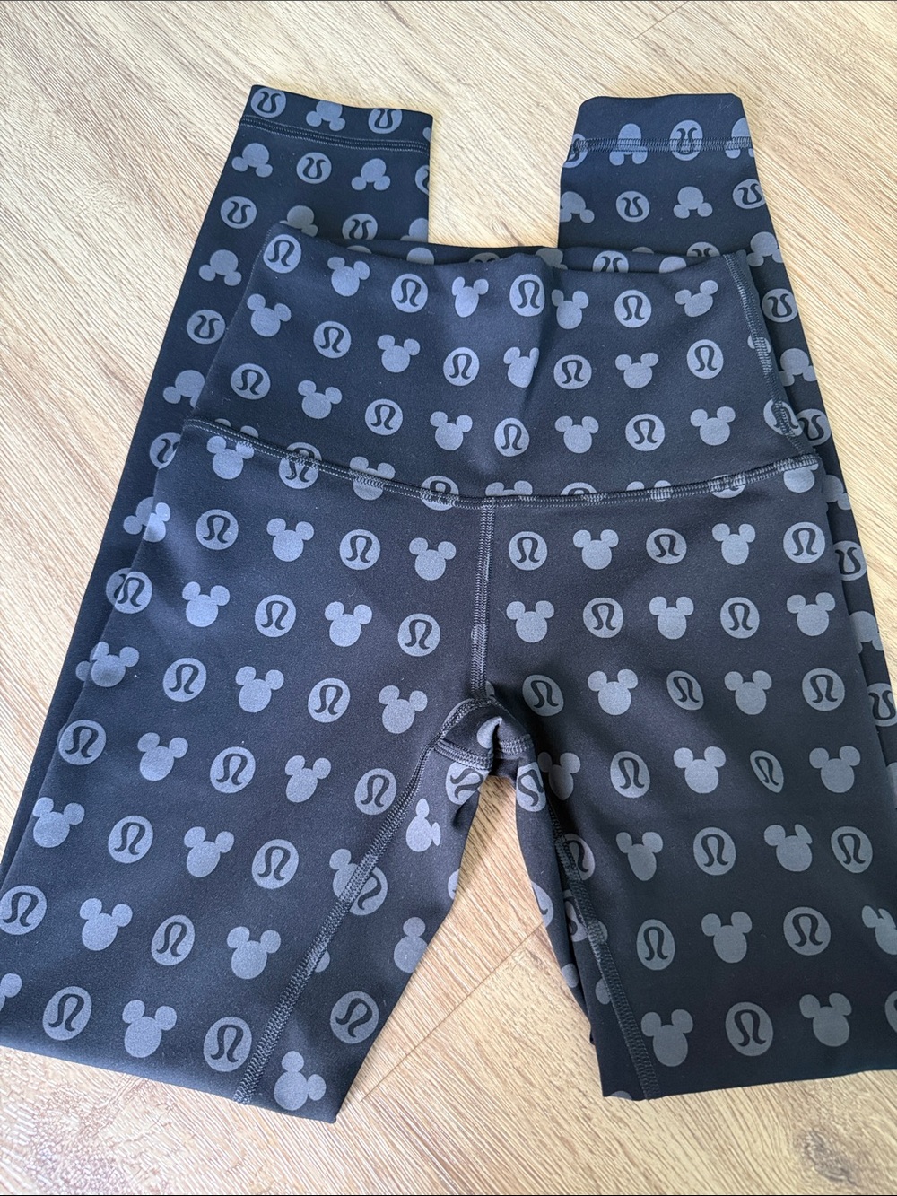 Disney x Lululemon Wunder Train High Rise Legging 25”. Size 2